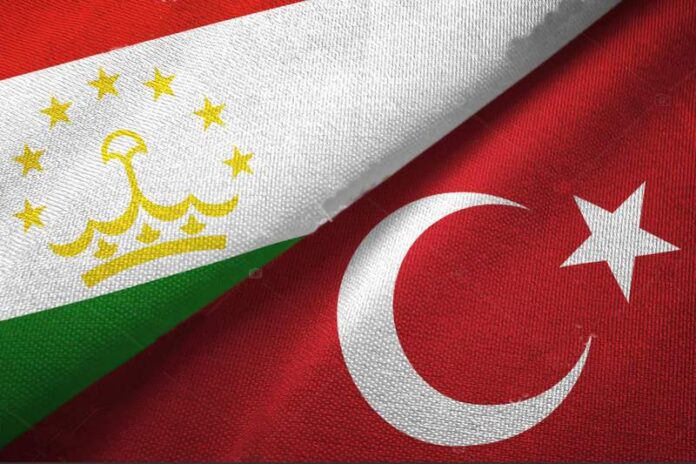 Tajikistan and Turkey flags together textile cloth, fabric texture